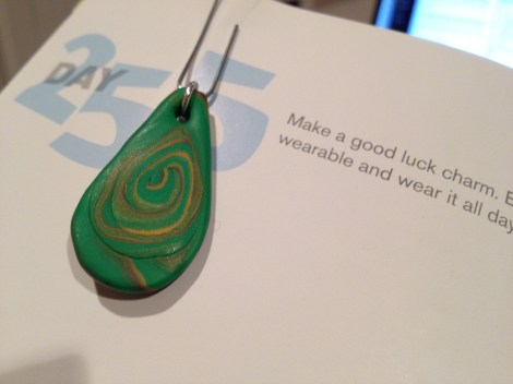 I made this "writing amulet" this evening. It's just a bit of clay, rolled and shaped and baked and attached to a paper clip. Nothing fancy. But it's charged with my hopes for great stories. I'll hang it on my journal pages while I write.